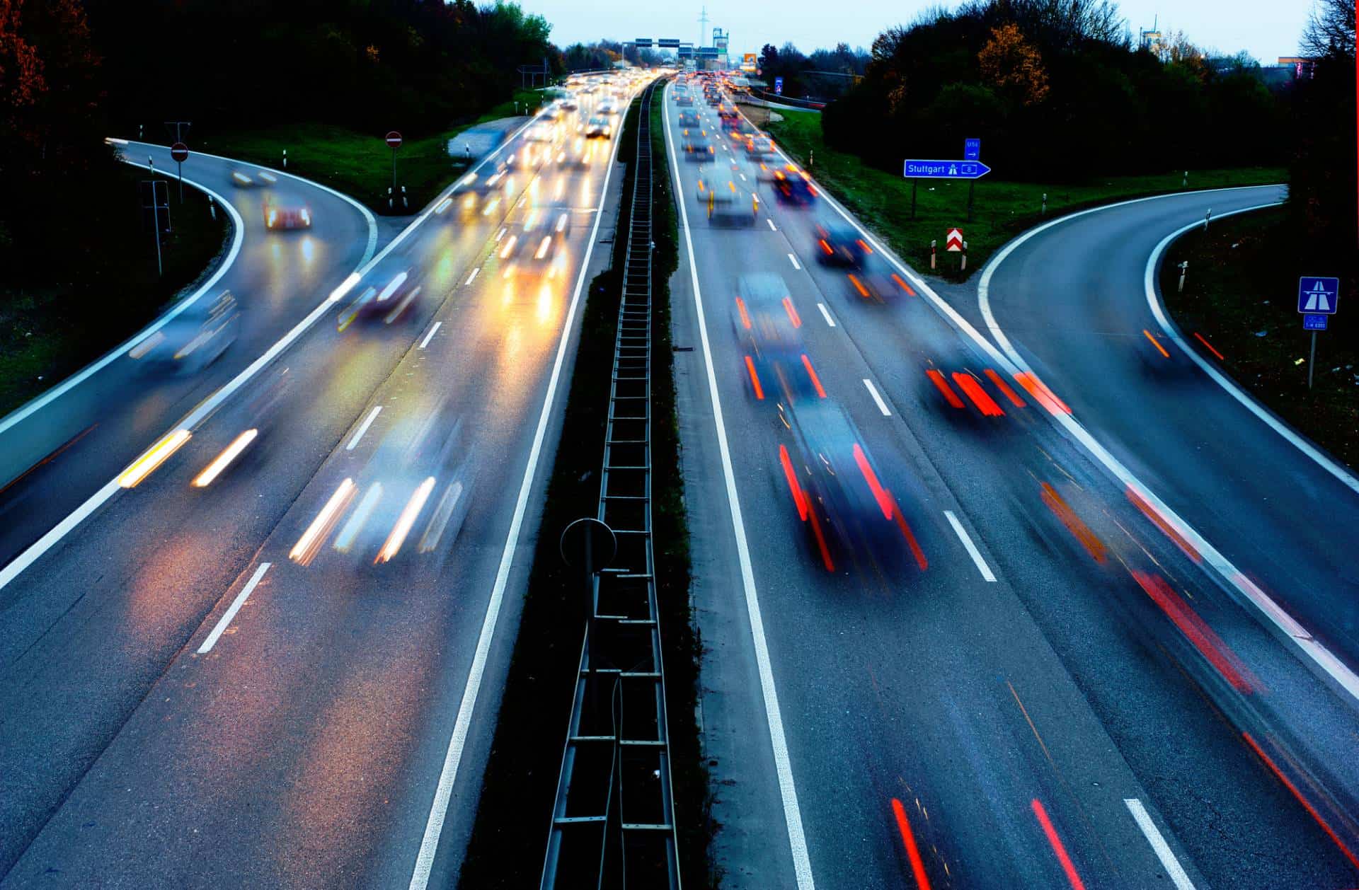 Cars on Autobahn in Germany at night.