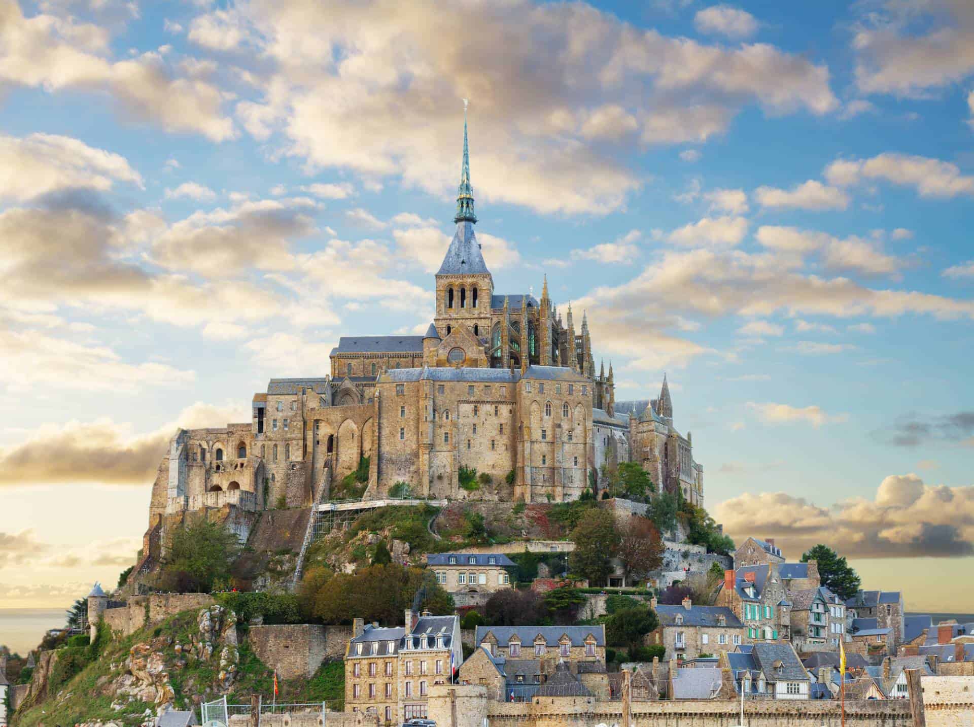 Mont-Saint-Michel in Normandy, France at sunset.