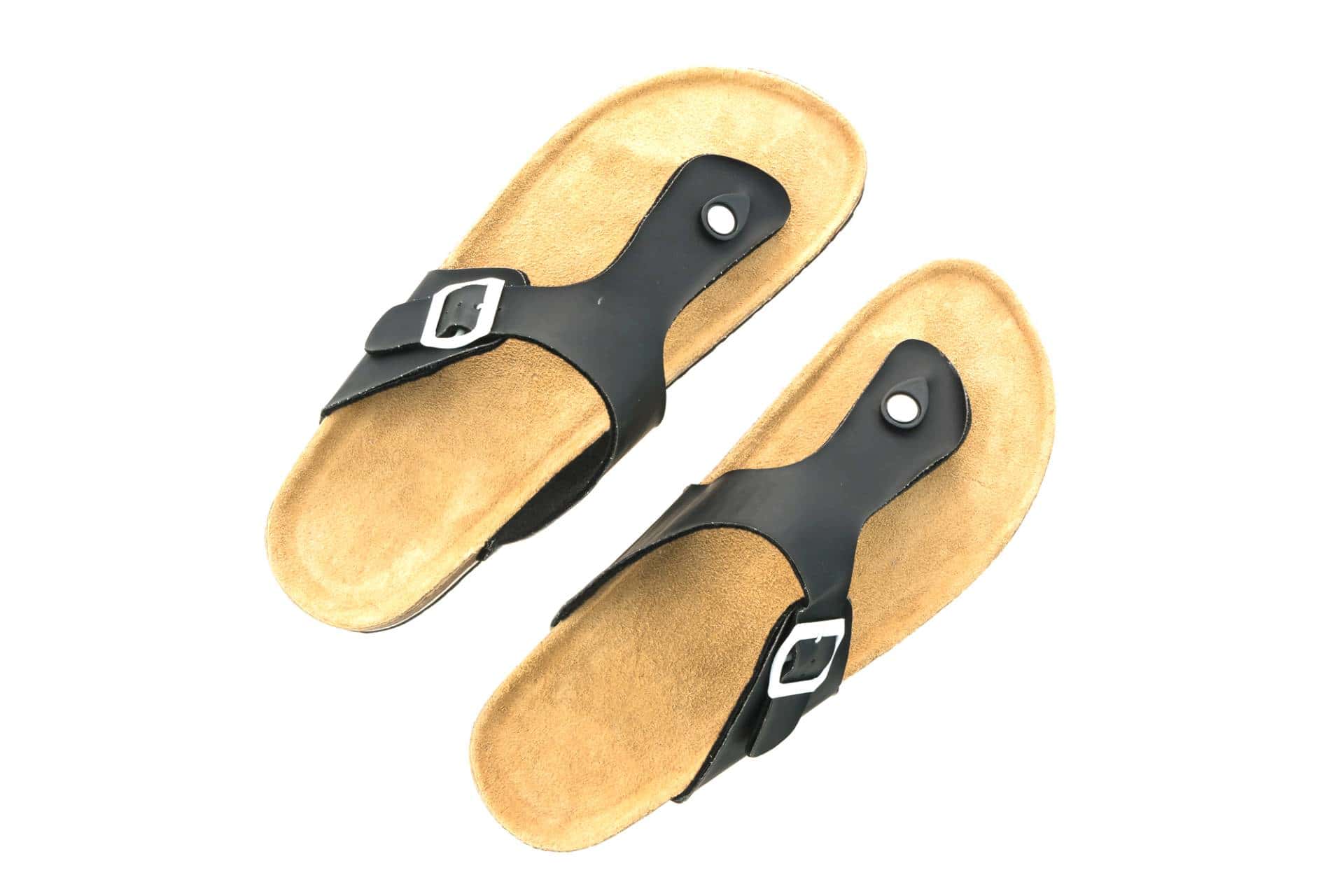 Leather sandals with black straps.