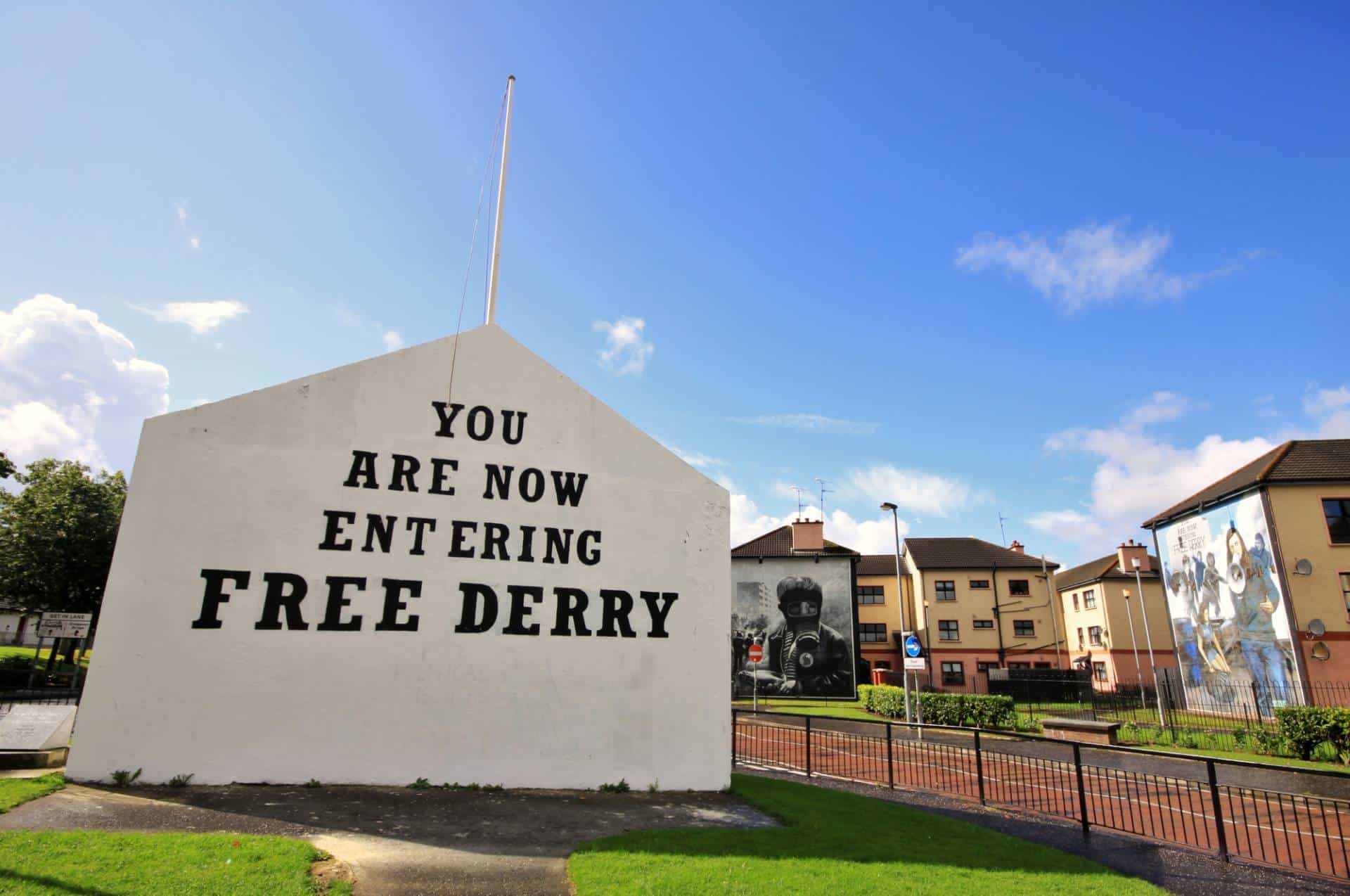 Bloody Sunday memorial wall paintings on a road in Londonderry (Derry), Ulster, Northern Ireland.