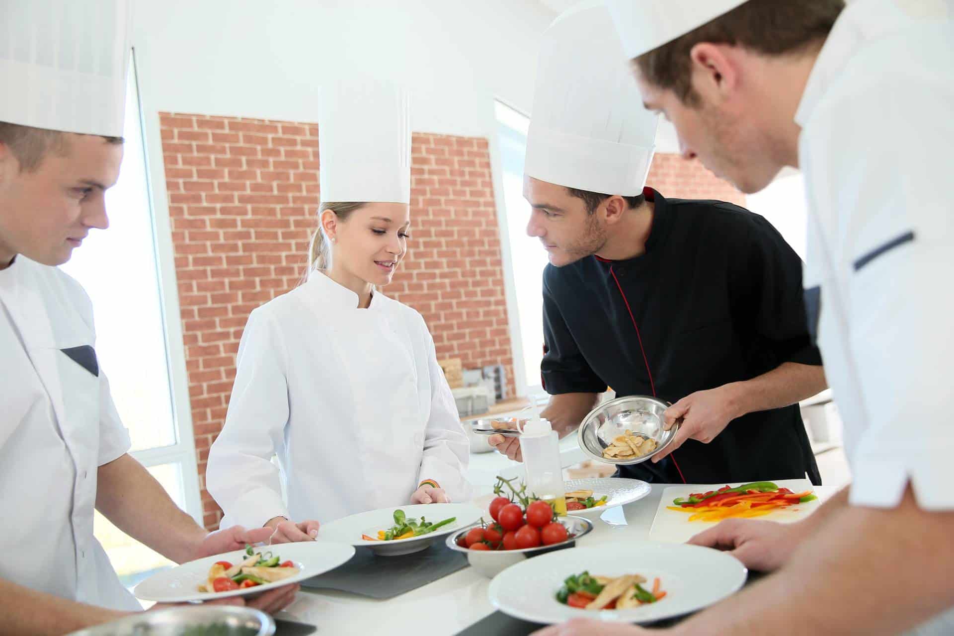 Chef training culinary school students.