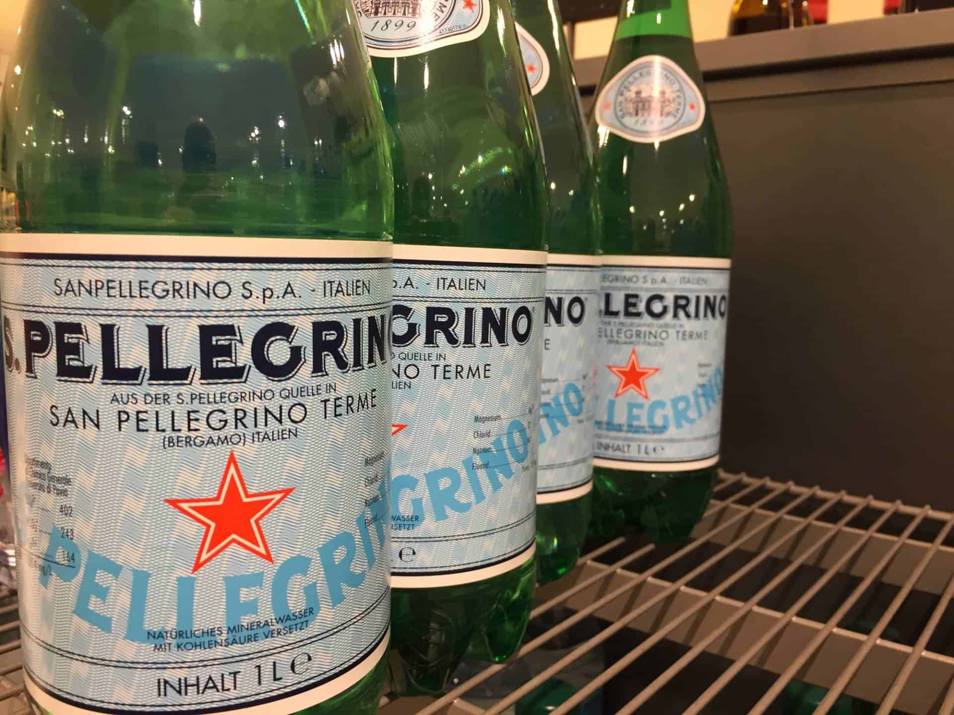 Bottles of San Pellegrino Italian sparkling mineral water.