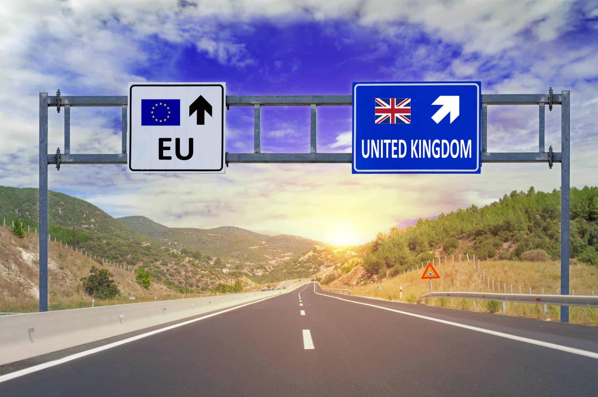 Two options - EU and the United Kingdom on road signs on highway